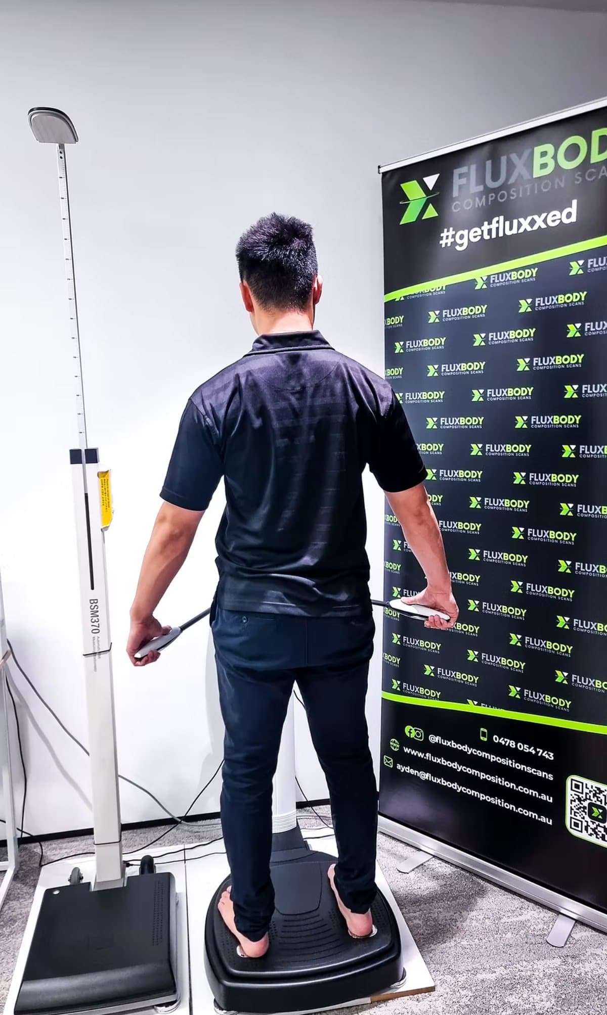Employee being scanned at an on-site FluxBody corporate visit